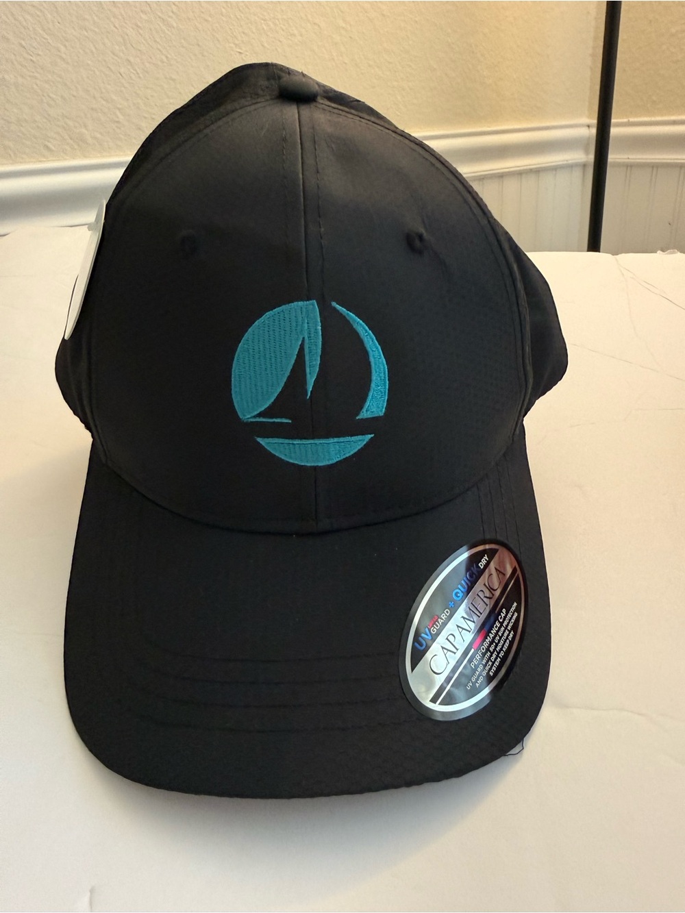 Sports Cap with Teal Sailboat Embroidery - Cap America